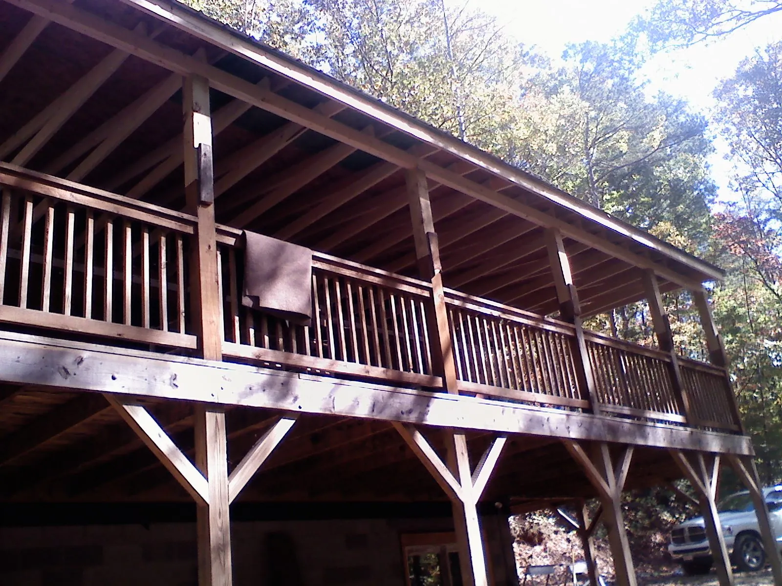 Timber framing under a new elevated porch and deck — Roof Leak Repair in Hankamer by Roofing Brothers